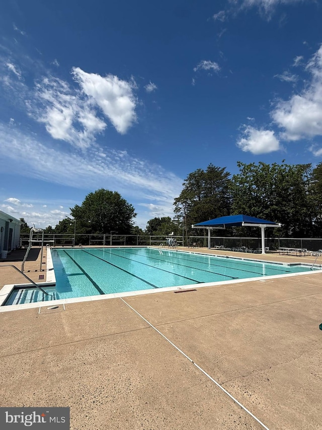 201 Anchor Cv, Stafford, VA 22554 - community pool with a patio area