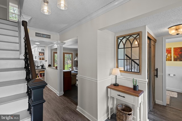 8 Pheasant Run Ct, Lutherville Timonium, MD 21093 - entrance foyer featuring a textured ceiling, dark wood-type flooring, stairway, ornate columns, and healthy amount of natural light