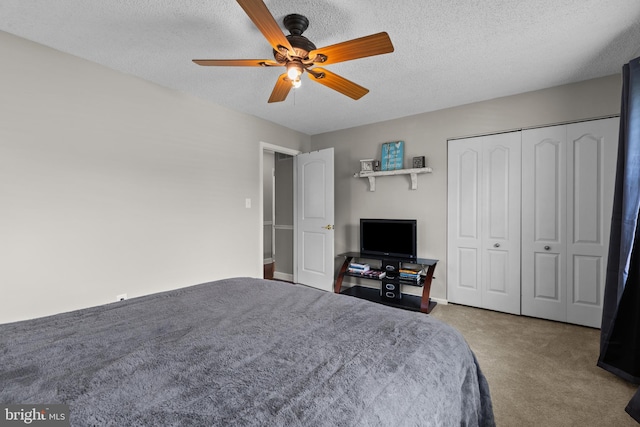 8 Pheasant Run Ct, Lutherville Timonium, MD 21093 - bedroom with carpet flooring, a textured ceiling, a closet, and ceiling fan
