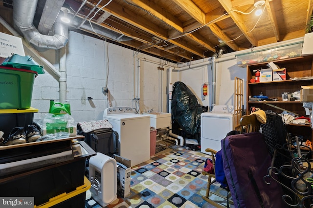 8 Pheasant Run Ct, Lutherville Timonium, MD 21093 - unfinished below grade area featuring separate washer and dryer, tile patterned floors, and a sink