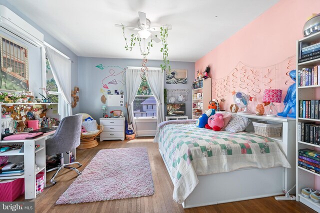 714 W St, Laurel, DE 19956 - bedroom featuring multiple windows and wood finished floors
