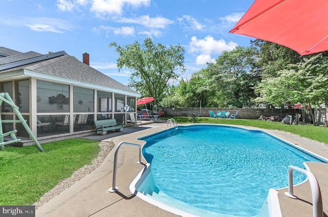 714 W St, Laurel, DE 19956 - view of swimming pool with a sunroom and a patio