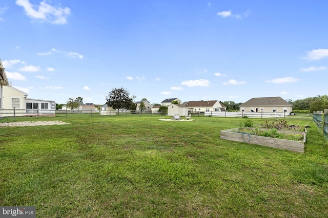 view of yard featuring a vegetable garden
