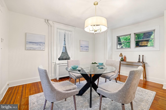 46 Murray Ave, Annapolis, MD 21401 - dining space featuring baseboards, a chandelier, and wood finished floors