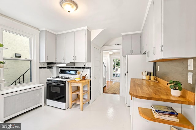 46 Murray Ave, Annapolis, MD 21401 - kitchen featuring gas range oven, freestanding refrigerator, concrete floors, gray cabinets, and butcher block countertops