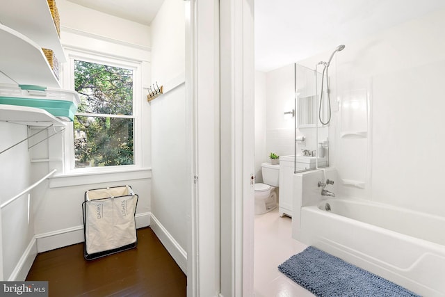 46 Murray Ave, Annapolis, MD 21401 - bathroom with toilet, shower / tub combination, wood finished floors, baseboards, and a sink
