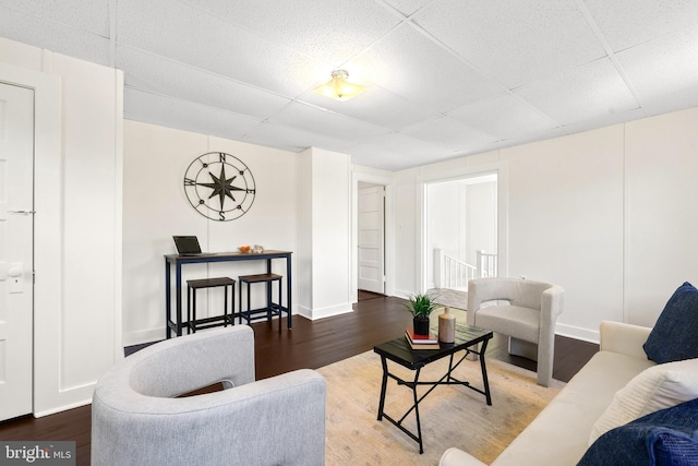 46 Murray Ave, Annapolis, MD 21401 - living area with a drop ceiling, wood finished floors, and baseboards