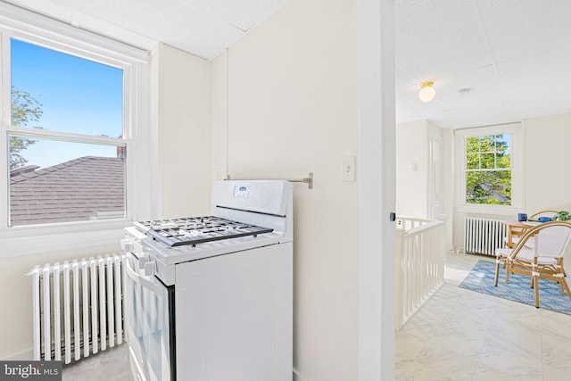 46 Murray Ave, Annapolis, MD 21401 - kitchen featuring radiator and white gas range