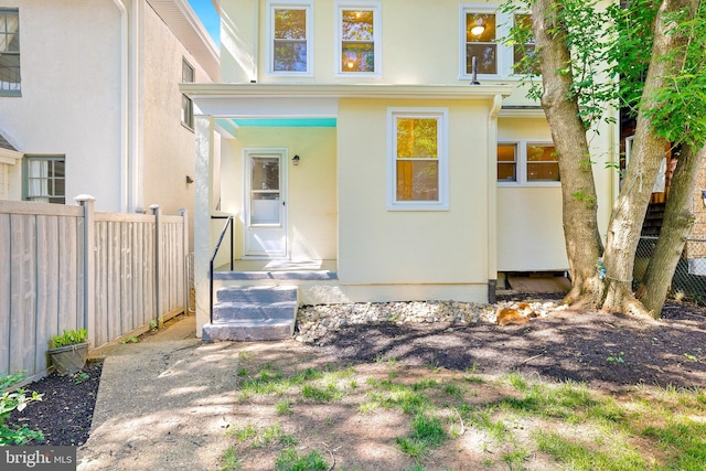 46 Murray Ave, Annapolis, MD 21401 - doorway to property featuring fence and stucco siding