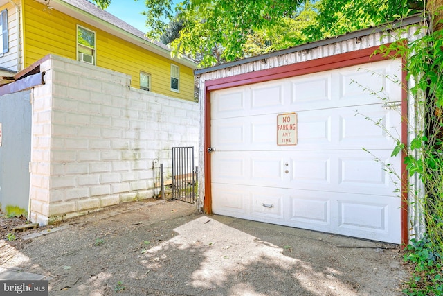 46 Murray Ave, Annapolis, MD 21401 - garage with fence, driveway, and a gate
