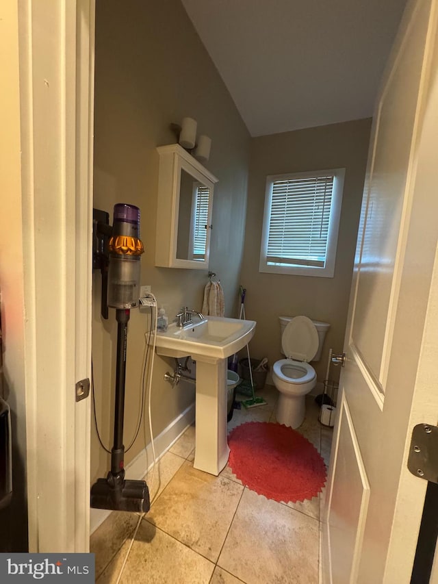 641 N 12th St, Philadelphia, PA 19123 - bathroom with tile patterned floors, toilet, and lofted ceiling