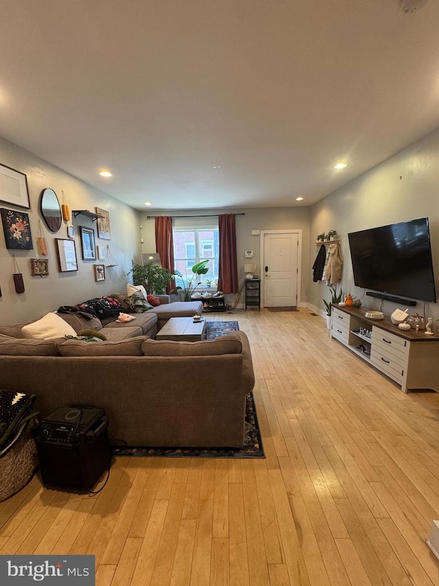 641 N 12th St, Philadelphia, PA 19123 - living area with light wood-type flooring and recessed lighting