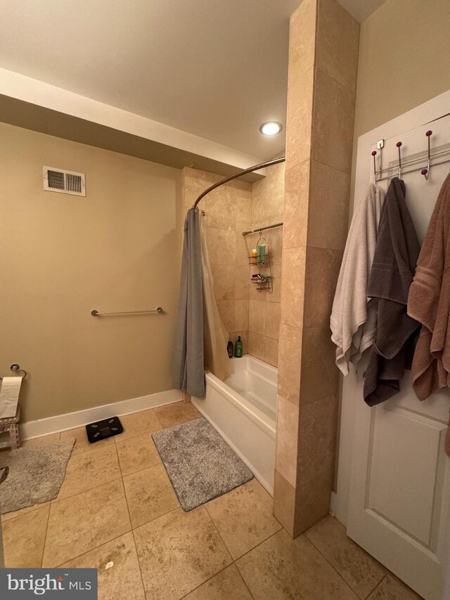 641 N 12th St, Philadelphia, PA 19123 - full bath featuring tile patterned flooring, shower / tub combo, and baseboards