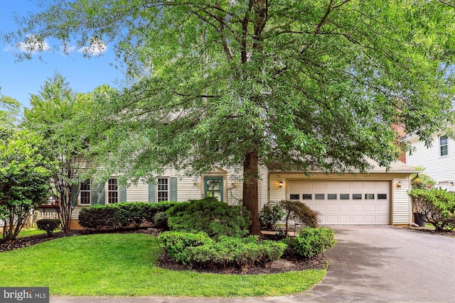 10007 Marshall Pond Rd, Burke, VA 22015 - view of property hidden behind natural elements with asphalt driveway and a front lawn