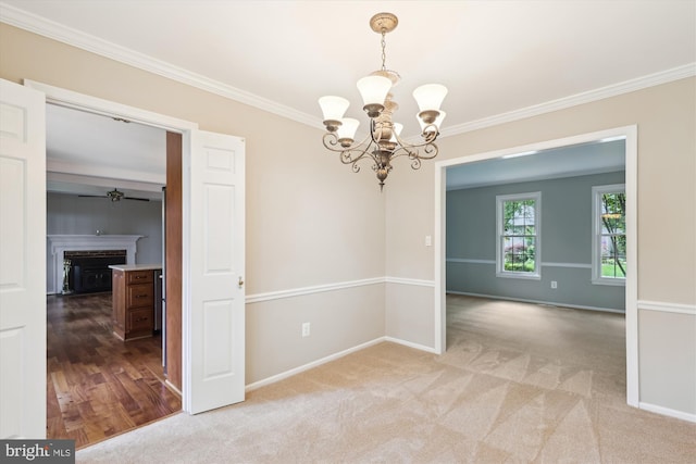 10007 Marshall Pond Rd, Burke, VA 22015 - carpeted spare room with a chandelier, crown molding, baseboards, and a ceiling fan