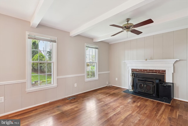 10007 Marshall Pond Rd, Burke, VA 22015 - unfurnished living room with beam ceiling, plenty of natural light, wood finished floors, ceiling fan, and wainscoting