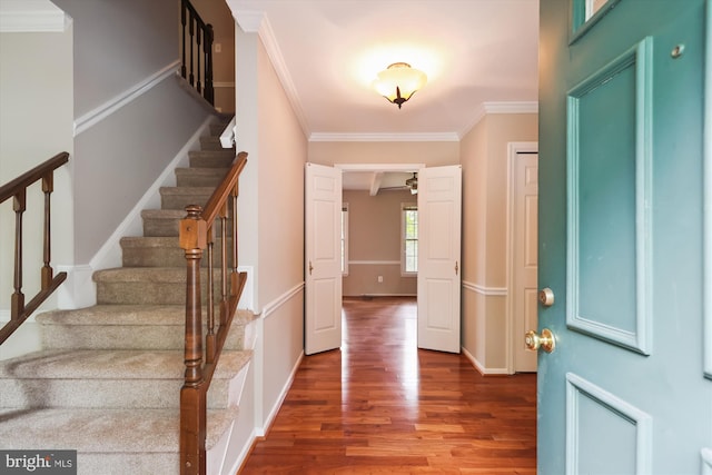 10007 Marshall Pond Rd, Burke, VA 22015 - foyer with wood finished floors, stairs, crown molding, and baseboards