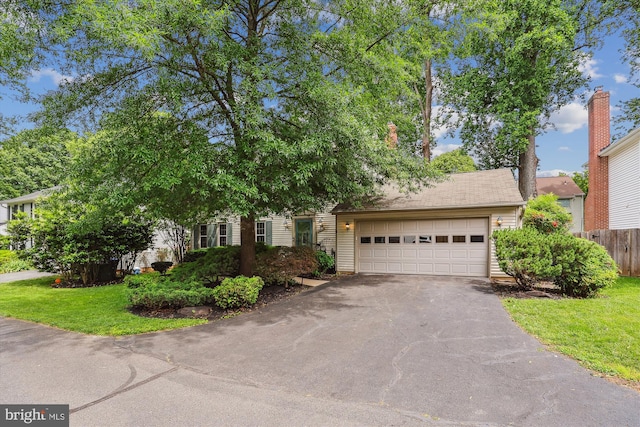 10007 Marshall Pond Rd, Burke, VA 22015 - view of property hidden behind natural elements with driveway and a garage
