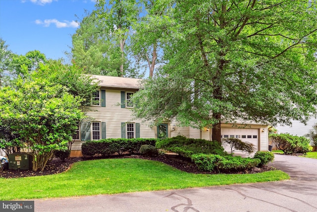 10007 Marshall Pond Rd, Burke, VA 22015 - view of front of house featuring asphalt driveway and a front lawn