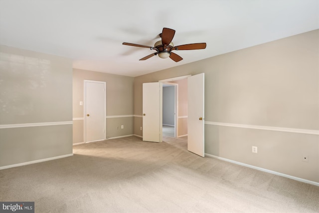 10007 Marshall Pond Rd, Burke, VA 22015 - unfurnished room featuring carpet flooring, a ceiling fan, and baseboards