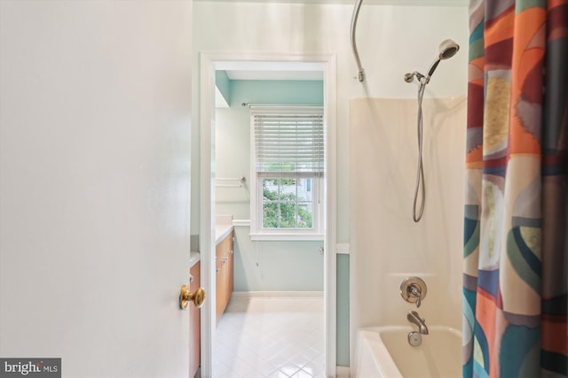 10007 Marshall Pond Rd, Burke, VA 22015 - full bath featuring shower / bath combo, tile patterned floors, vanity, and baseboards