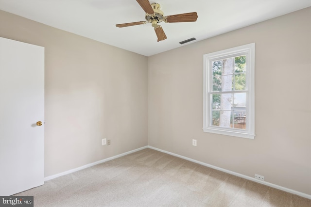 10007 Marshall Pond Rd, Burke, VA 22015 - spare room with light colored carpet, baseboards, and a ceiling fan