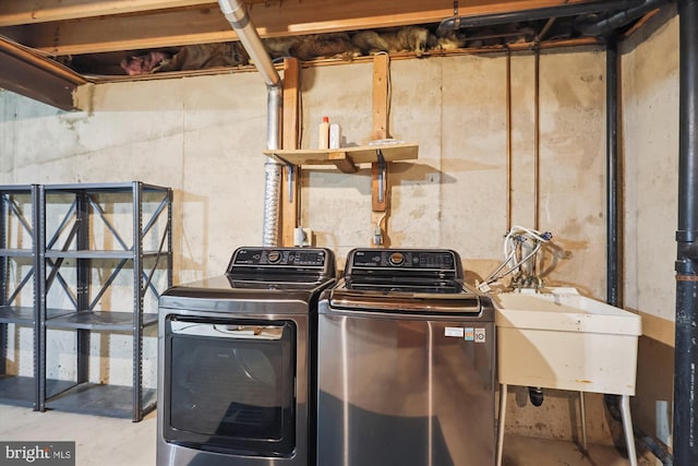 10007 Marshall Pond Rd, Burke, VA 22015 - laundry room with washing machine and clothes dryer