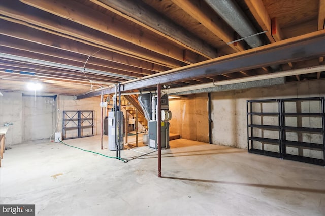10007 Marshall Pond Rd, Burke, VA 22015 - unfinished basement with water heater and heating unit