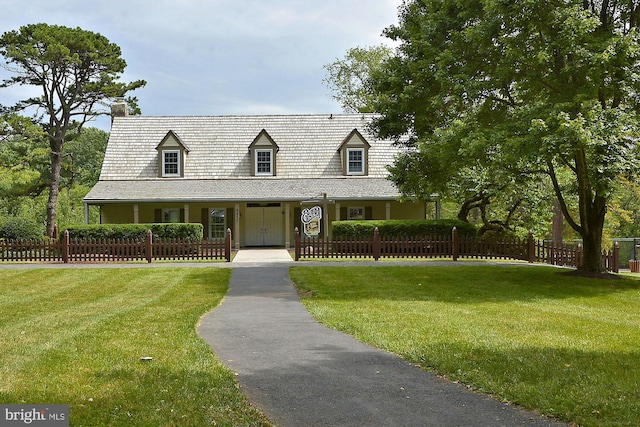 10007 Marshall Pond Rd, Burke, VA 22015 - view of front facade featuring a chimney and covered porch