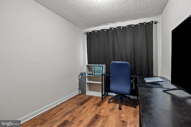 2020 Valley View Dr, Folcroft, PA 19032 - office area featuring wood finished floors, a textured ceiling, and baseboards