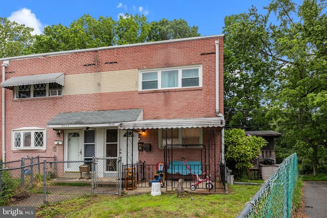 2020 Valley View Dr, Folcroft, PA 19032 - rear view of property with a gate, a fenced front yard, and brick siding