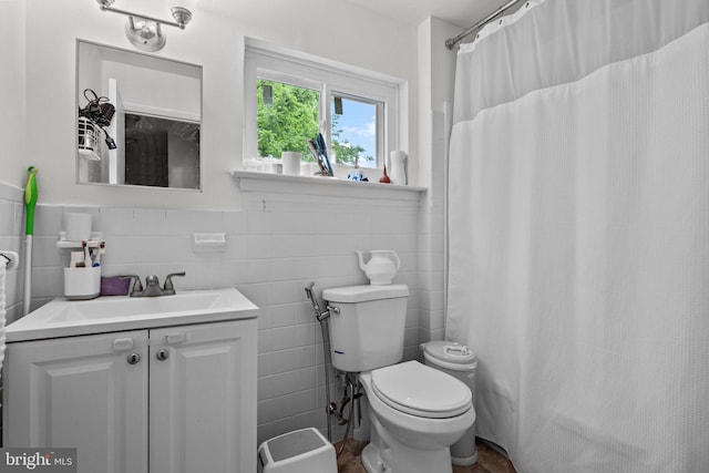 2020 Valley View Dr, Folcroft, PA 19032 - bathroom featuring tile walls, toilet, vanity, and a shower with curtain