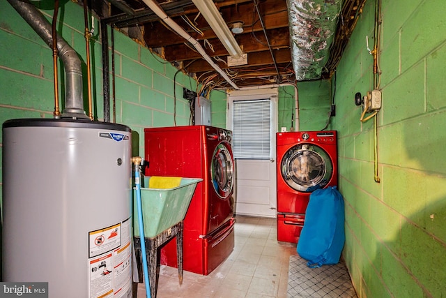 2020 Valley View Dr, Folcroft, PA 19032 - unfinished below grade area featuring gas water heater, separate washer and dryer, and concrete block wall