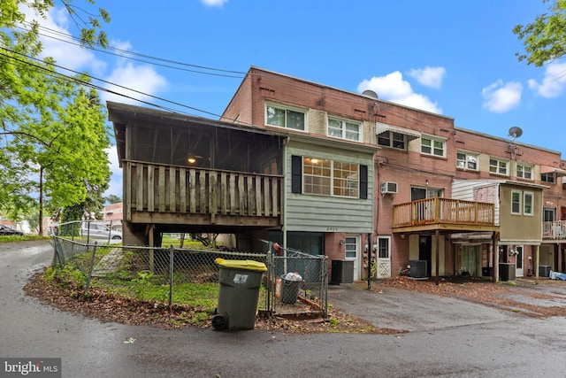 2020 Valley View Dr, Folcroft, PA 19032 - view of building exterior featuring fence, a wall mounted AC, and central air condition unit