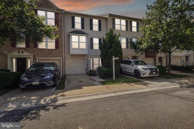 7163 Deep Falls Way Unit 139, Elkridge, MD 21075 - multi unit property with driveway, a garage, and brick siding