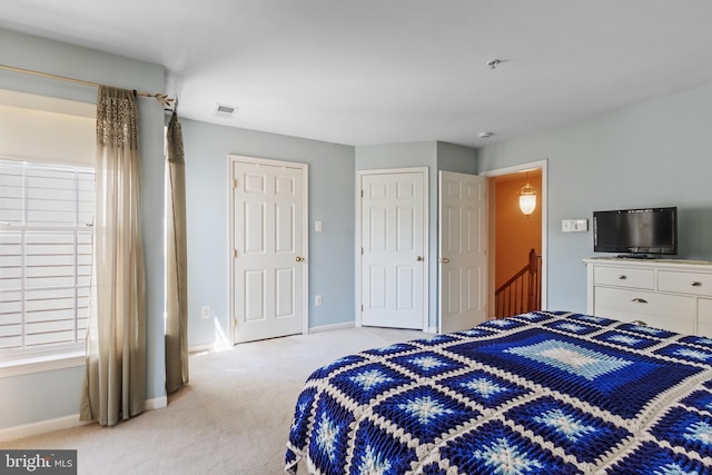 7163 Deep Falls Way Unit 139, Elkridge, MD 21075 - bedroom featuring light carpet, baseboards, and a closet