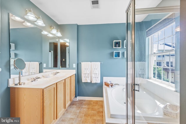 7163 Deep Falls Way Unit 139, Elkridge, MD 21075 - bathroom featuring double vanity, a bath, and baseboards
