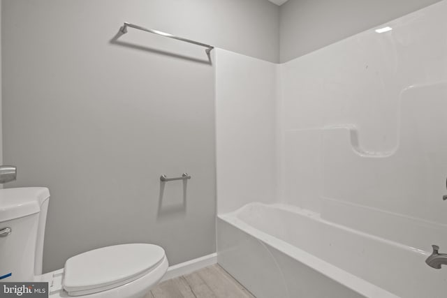 1500A Embassy, Harrisburg, PA 17109 - full bathroom featuring toilet, wood finished floors, tub / shower combination, and baseboards