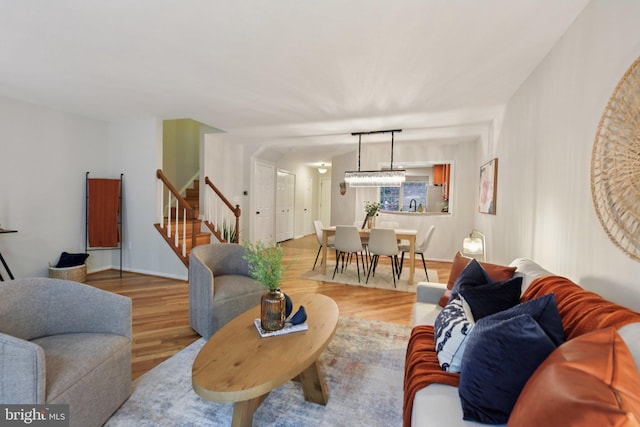 14321 Long Channel Dr, Germantown, MD 20874 - living room featuring stairway and wood finished floors
