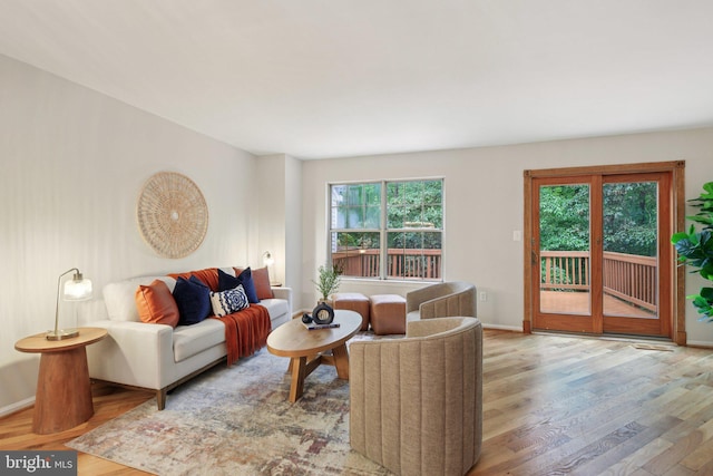 14321 Long Channel Dr, Germantown, MD 20874 - living room featuring wood finished floors and baseboards