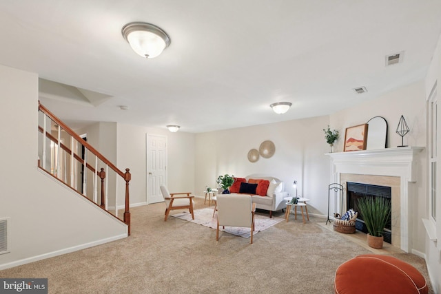 14321 Long Channel Dr, Germantown, MD 20874 - living area featuring carpet floors, stairway, and a fireplace with flush hearth