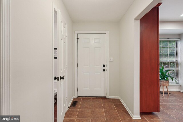 14321 Long Channel Dr, Germantown, MD 20874 - doorway to outside featuring tile patterned flooring and baseboards