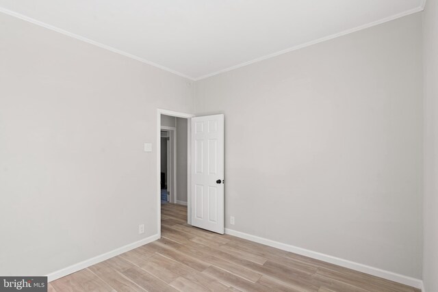 341 Ives Ave, Penns Grove, NJ 08069 - spare room with light wood-style flooring, baseboards, and crown molding