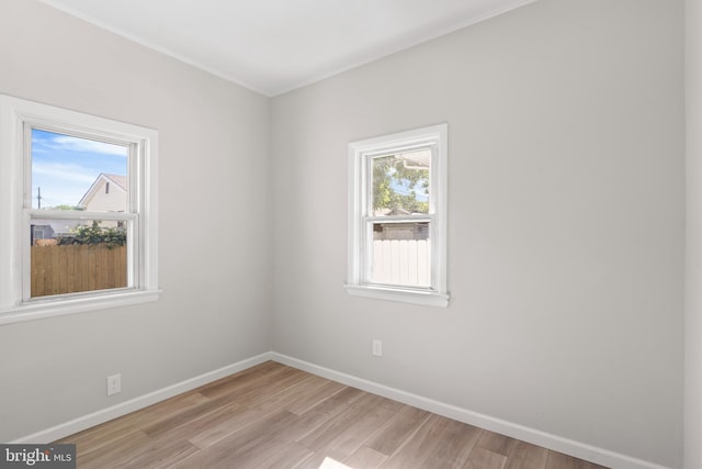 341 Ives Ave, Penns Grove, NJ 08069 - unfurnished room with light wood-style floors, baseboards, and crown molding