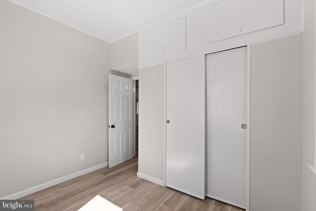341 Ives Ave, Penns Grove, NJ 08069 - unfurnished bedroom featuring light wood-type flooring, baseboards, and a closet