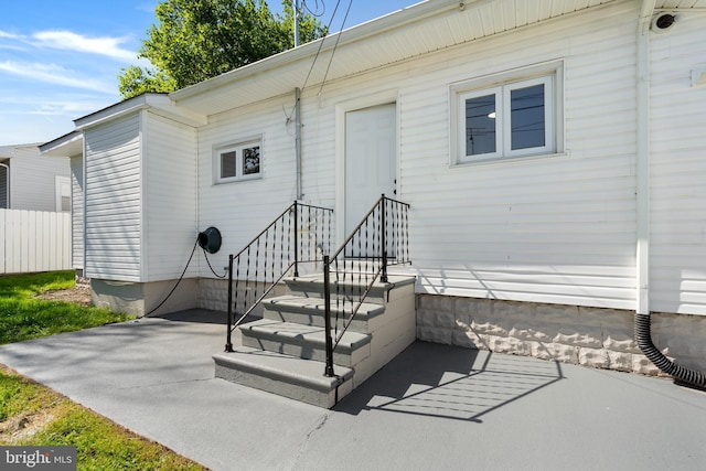 341 Ives Ave, Penns Grove, NJ 08069 - view of exterior entry with a patio and a surveillance system
