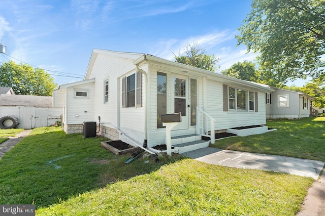 341 Ives Ave, Penns Grove, NJ 08069 - view of front of house with entry steps, central air condition unit, and a front lawn
