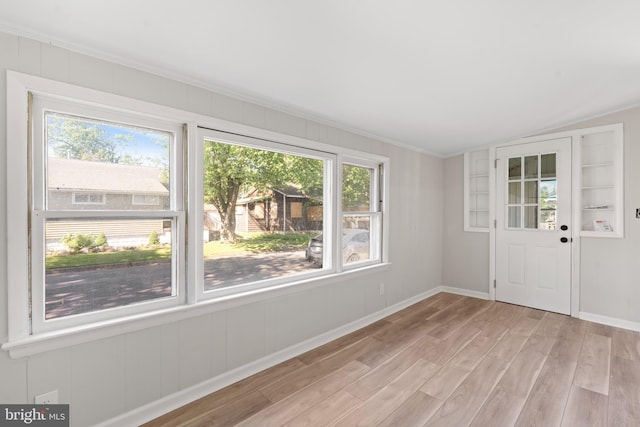 341 Ives Ave, Penns Grove, NJ 08069 - foyer featuring healthy amount of natural light, light wood-type flooring, baseboards, crown molding, and lofted ceiling