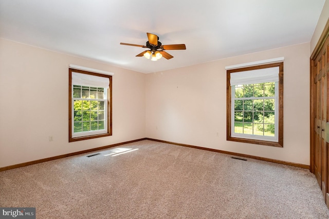 4 Apple Tree Ln, Hummelstown, PA 17036 - empty room with plenty of natural light, light carpet, and ceiling fan