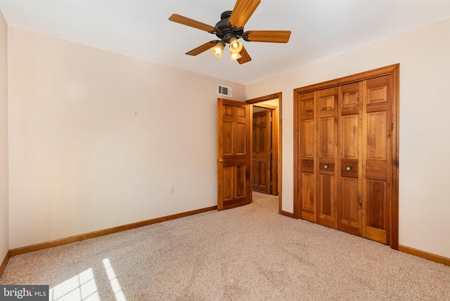 4 Apple Tree Ln, Hummelstown, PA 17036 - unfurnished bedroom featuring light carpet, a closet, and ceiling fan